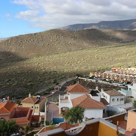 With A Serene Ocean And Mountain View Apartment